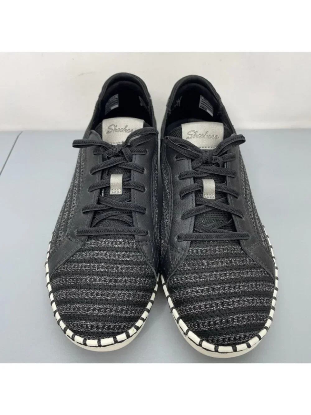 Skechers metallic black shows