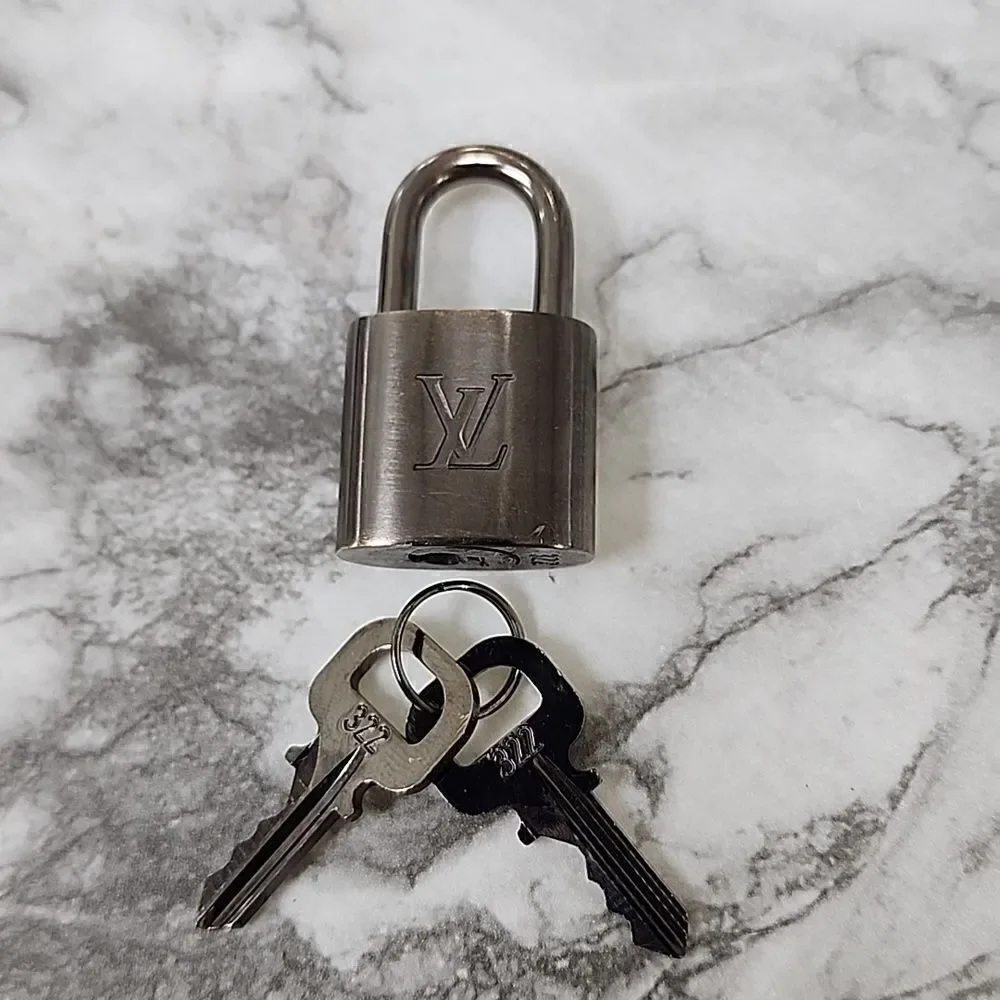 Authentic Louis Vuitton Silver Lock and Key