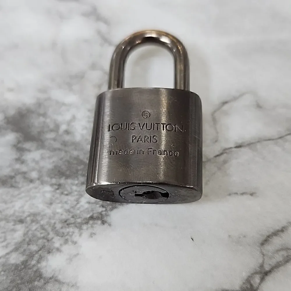 Authentic Louis Vuitton Silver Lock and Key