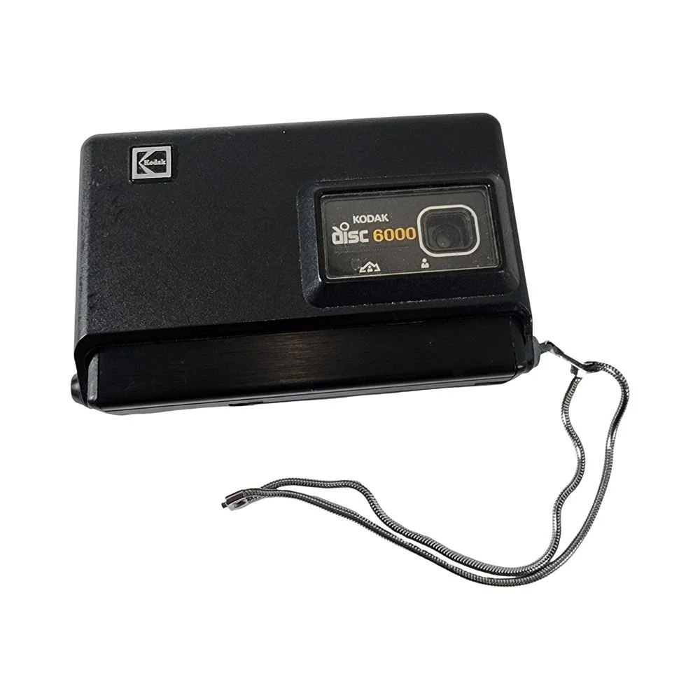 Kodak Disc 6000 Vintage Film Camera Black with Wrist Strap and‎ Film Cartridge