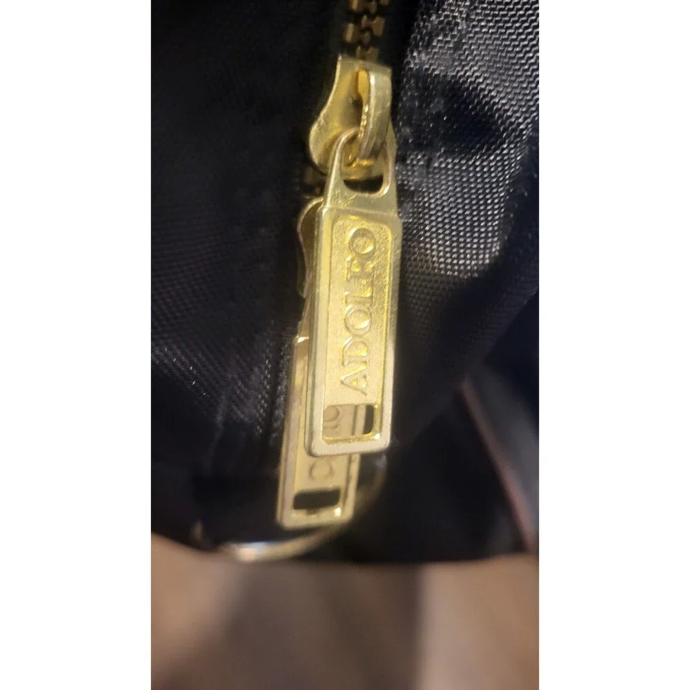 Adolfo this item