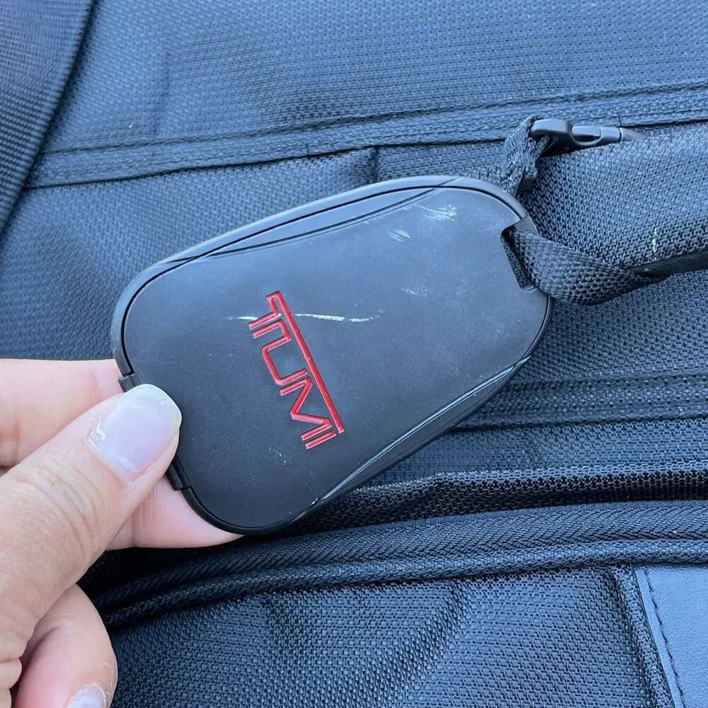 Tumi tri fold