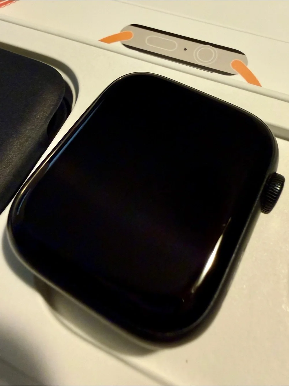 Apple Watch with Black Sport Band and Charger