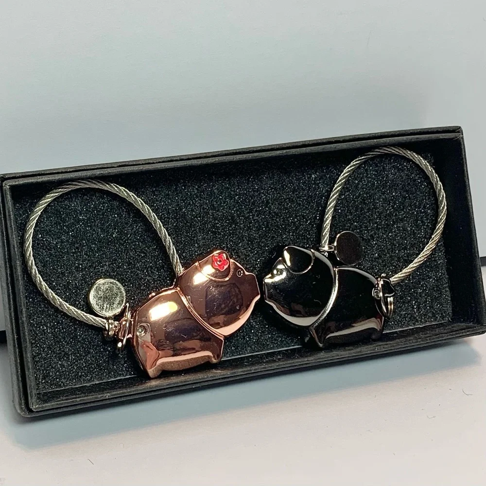 2 Charming Metal Piggies Cord Keychains
