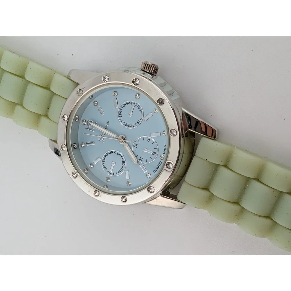 Geneva Watch Women 36mm Silver Case Light Green Silicone Band- New Battery