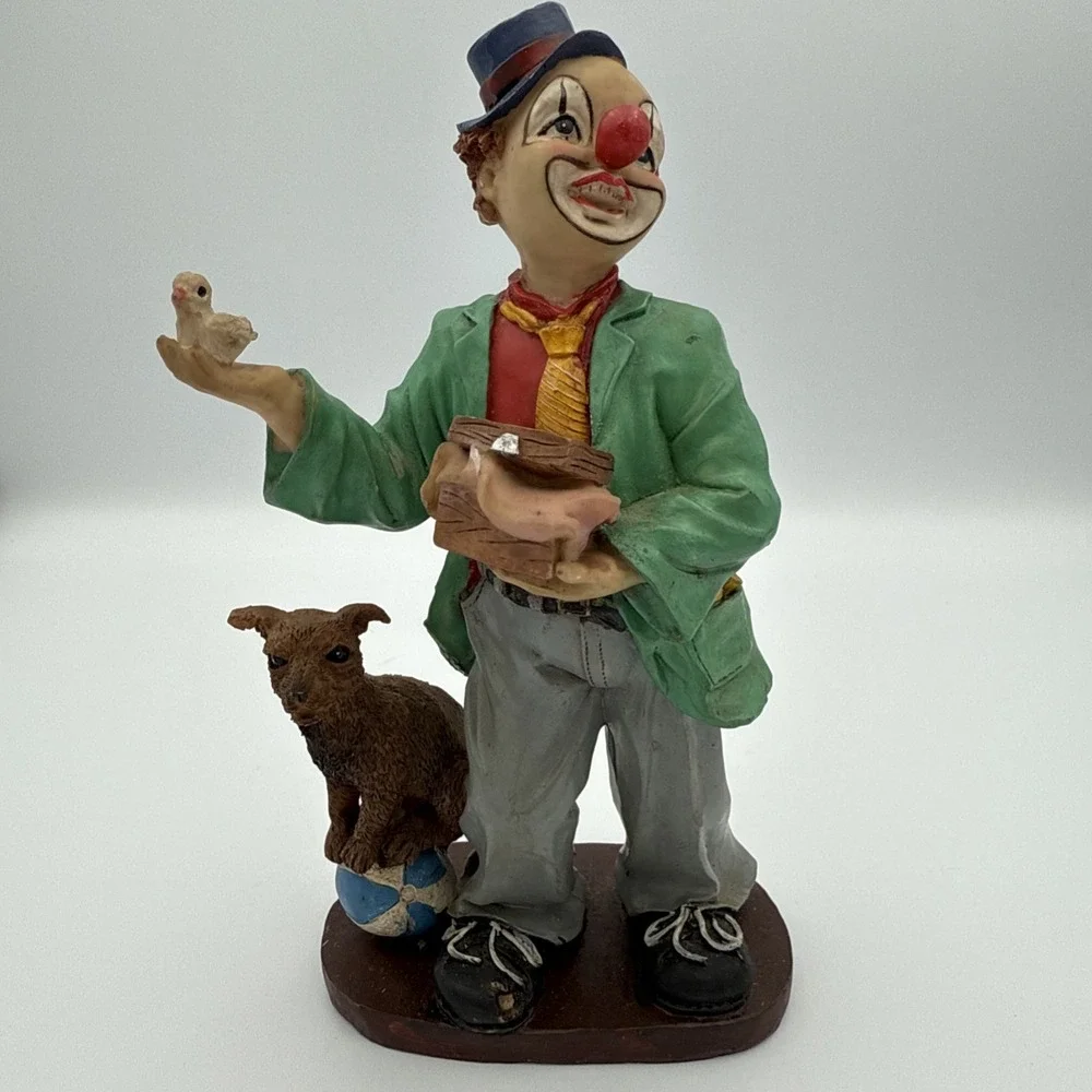 Vintage Clown Figurine With Bird In Hand And Dog Standing On A Ball