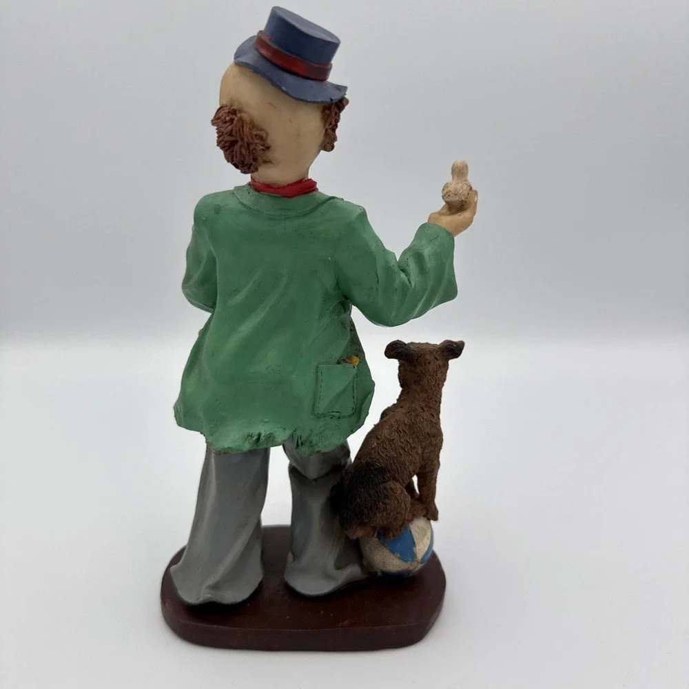 Vintage Clown Figurine With Bird In Hand And Dog Standing On A Ball