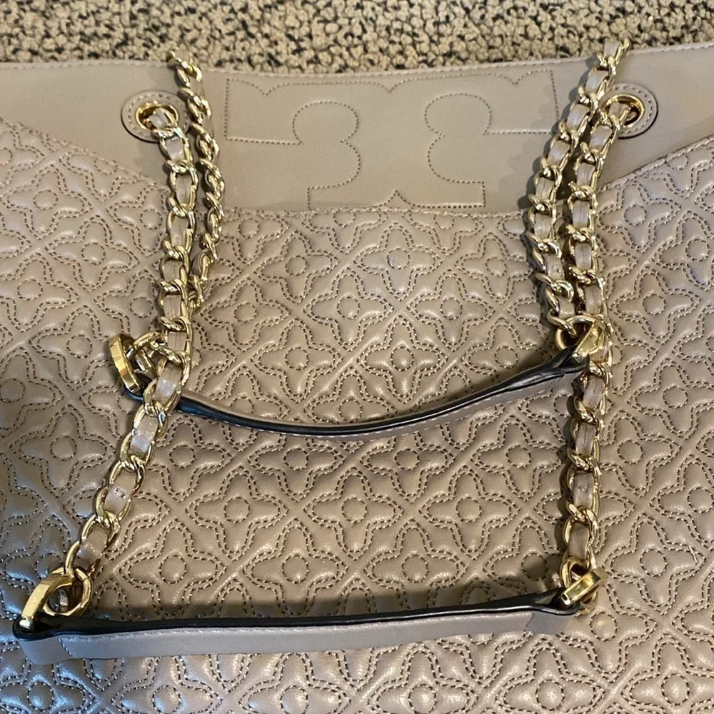Tory Burch also matching smaller