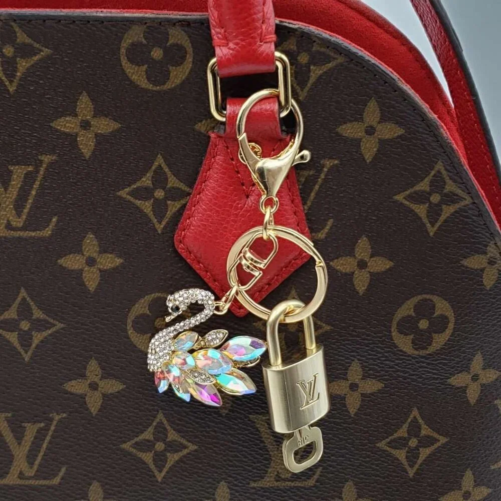 Authentic Louis Vuitton Gold Lock 🔒 Keychain Bag Unbranded Swan Charm LV