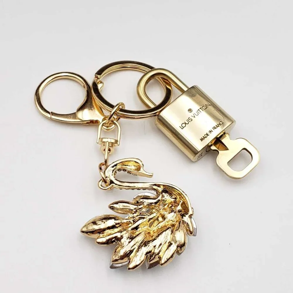 Authentic Louis Vuitton Gold Lock 🔒 Keychain Bag Unbranded Swan Charm LV