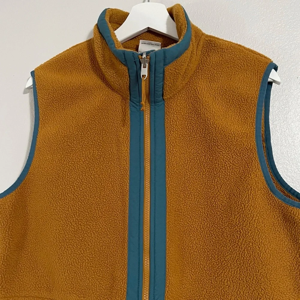 The North Face zipper tan center