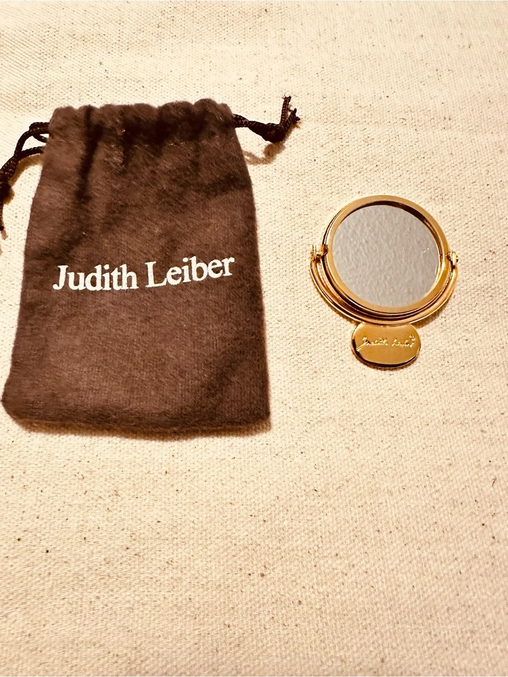 Judith Leiber bundle scratches