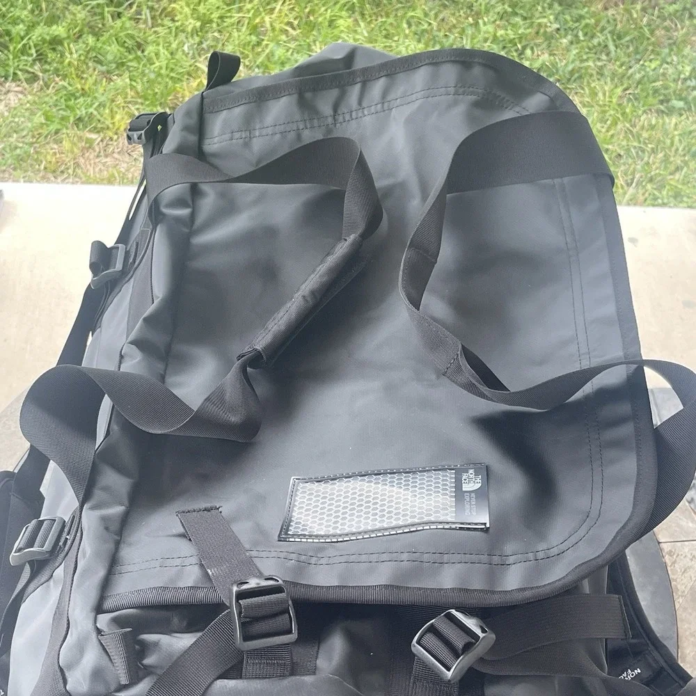 The North Face Black Duffel Bag with White Logo