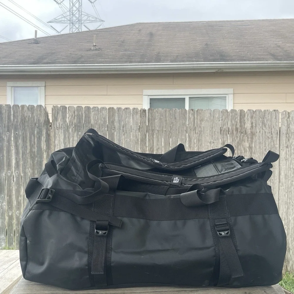 The North Face Black Duffel Bag with White Logo