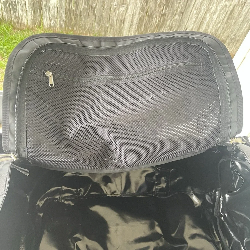 The North Face Black Duffel Bag with White Logo