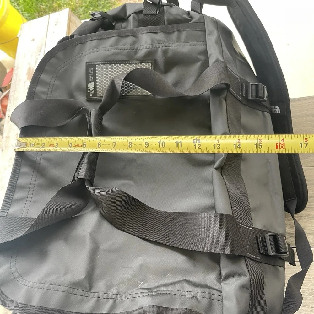 The North Face Black Duffel Bag with White Logo