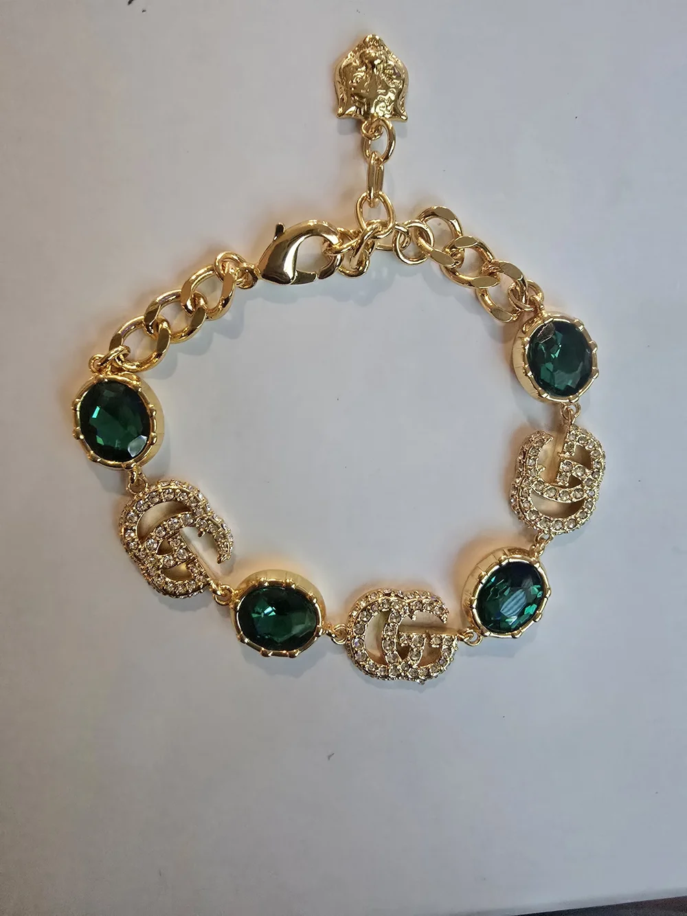 Gucci 18kgp GG Gold-Tone Bracelet with Emerald Green Crystal Accents
