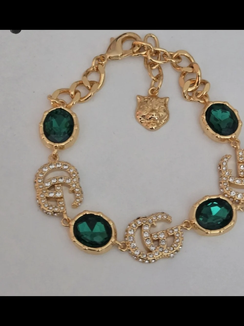 Gucci 18kgp GG Gold-Tone Bracelet with Emerald Green Crystal Accents