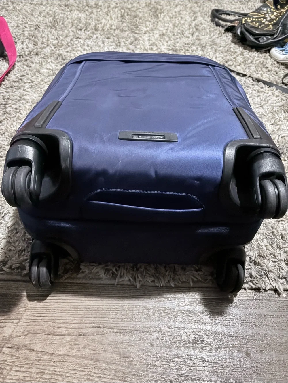 Tumi Carry-On Spinner rolling luggage