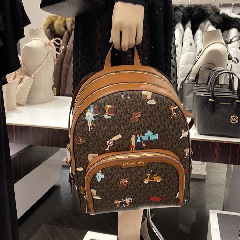 MICHAEL KORS JET SET GIRLS JAYCEE LARGE ZIP POCKET BACKPACK BROWN MULTI COLOR