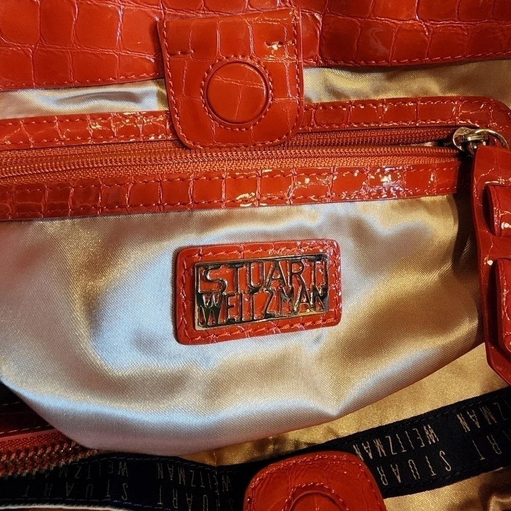 STUART WEITZMAN quilted tote with orange patent leather accents & gold hardware