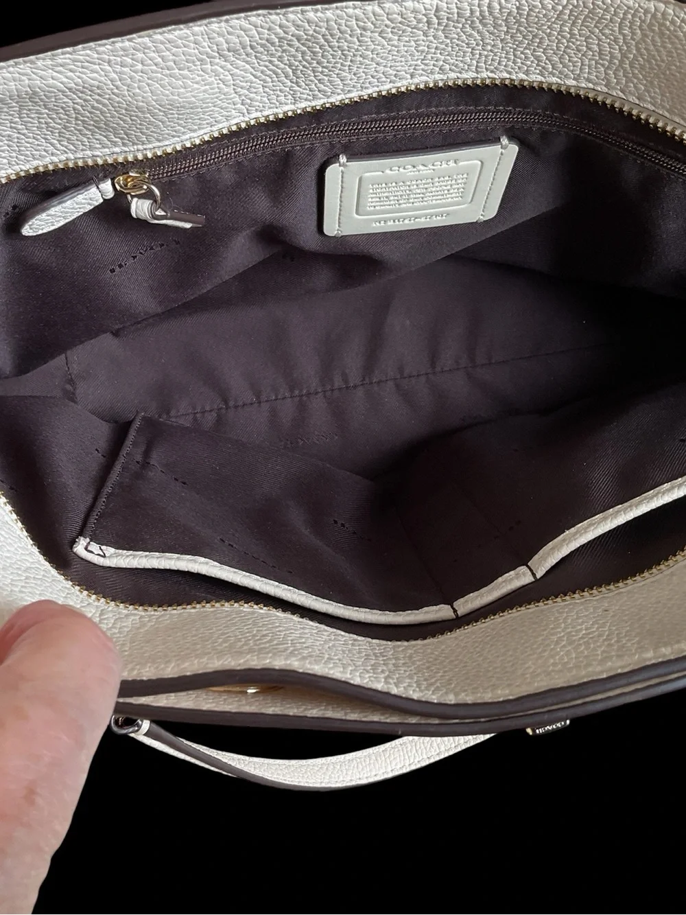 Coach cover still charm