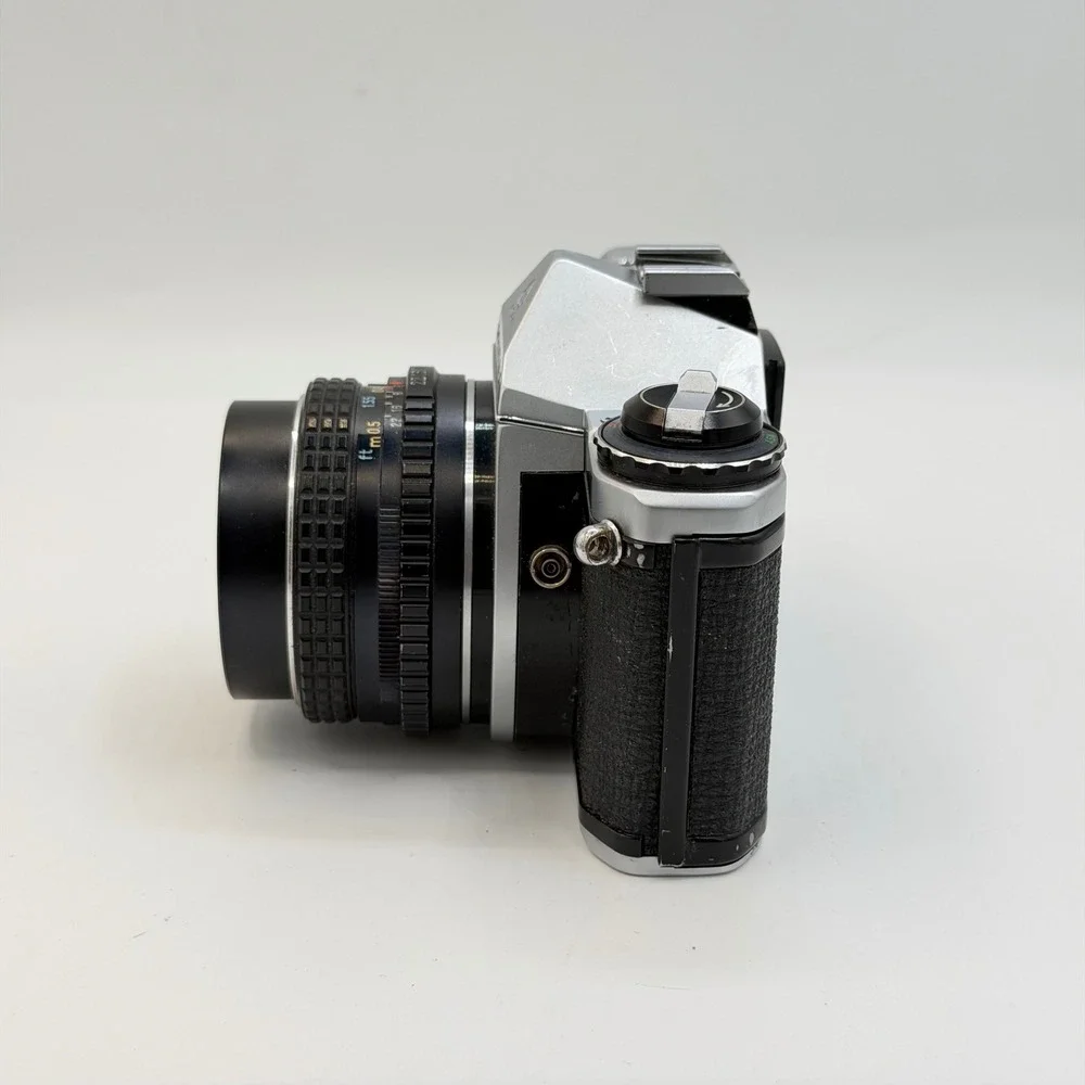 Pentax ME 35mm Film SLR Camera with SMC Pentax-M 50mm f1.7 Lens Silver Black