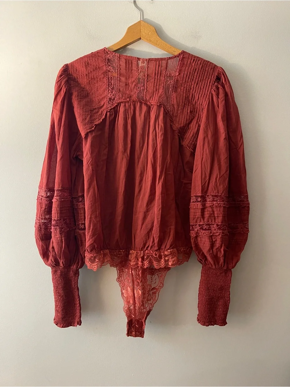 Free People Deep Red Lace Trim Long Sleeve Bodysuit