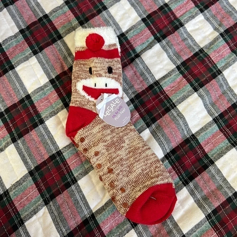The sock monkey has rubber on the bottom for slip resistant.-Copy
