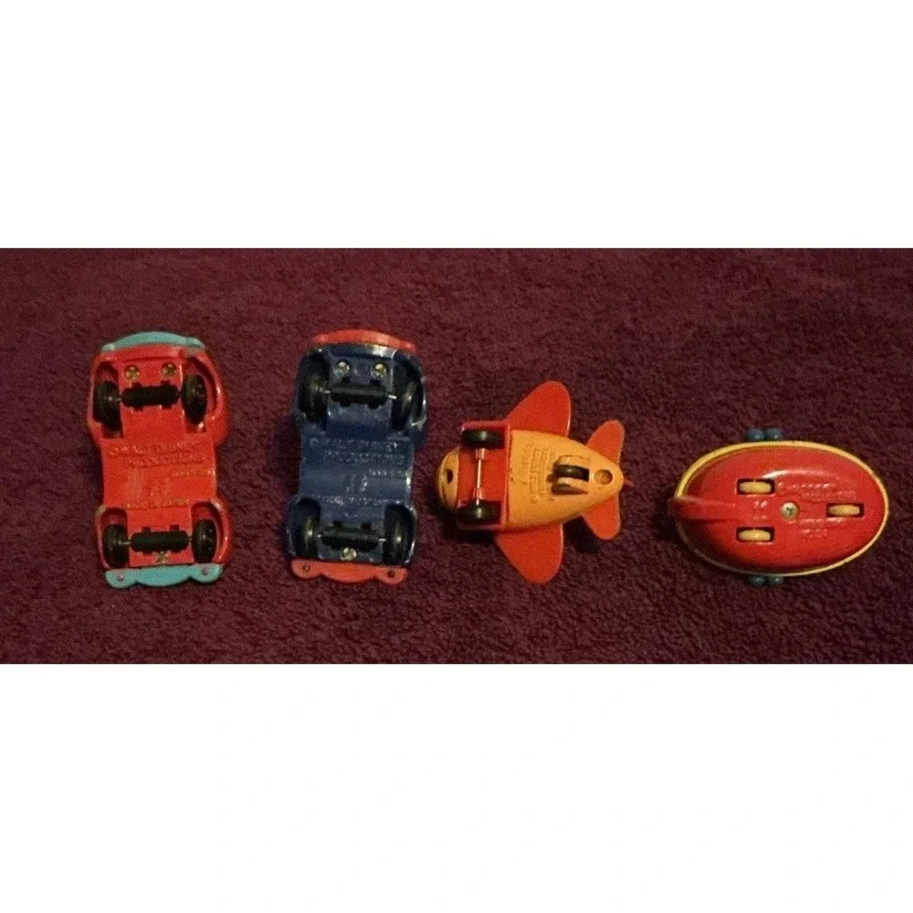 Lot Of 4 1970s Walt Disney Production Tomica Die Cast Cars, Boat & Airplane