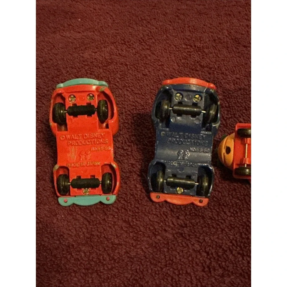 Lot Of 4 1970s Walt Disney Production Tomica Die Cast Cars, Boat & Airplane