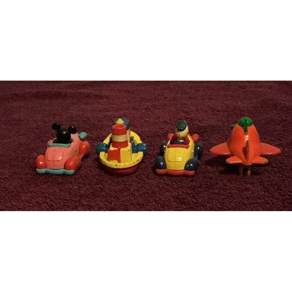 Lot Of 4 1970s Walt Disney Production Tomica Die Cast Cars, Boat & Airplane