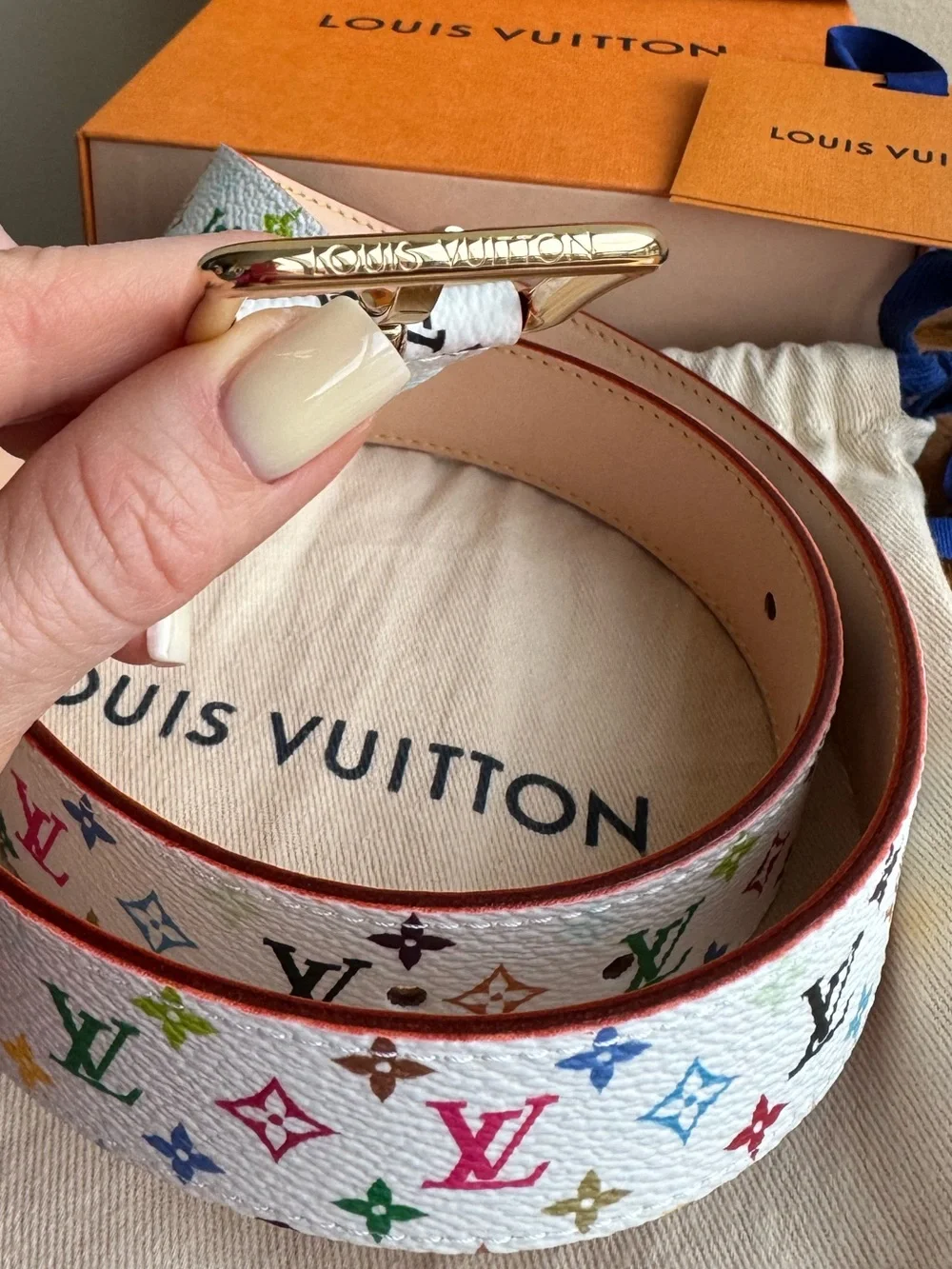 Louis Vuitton toned features charms