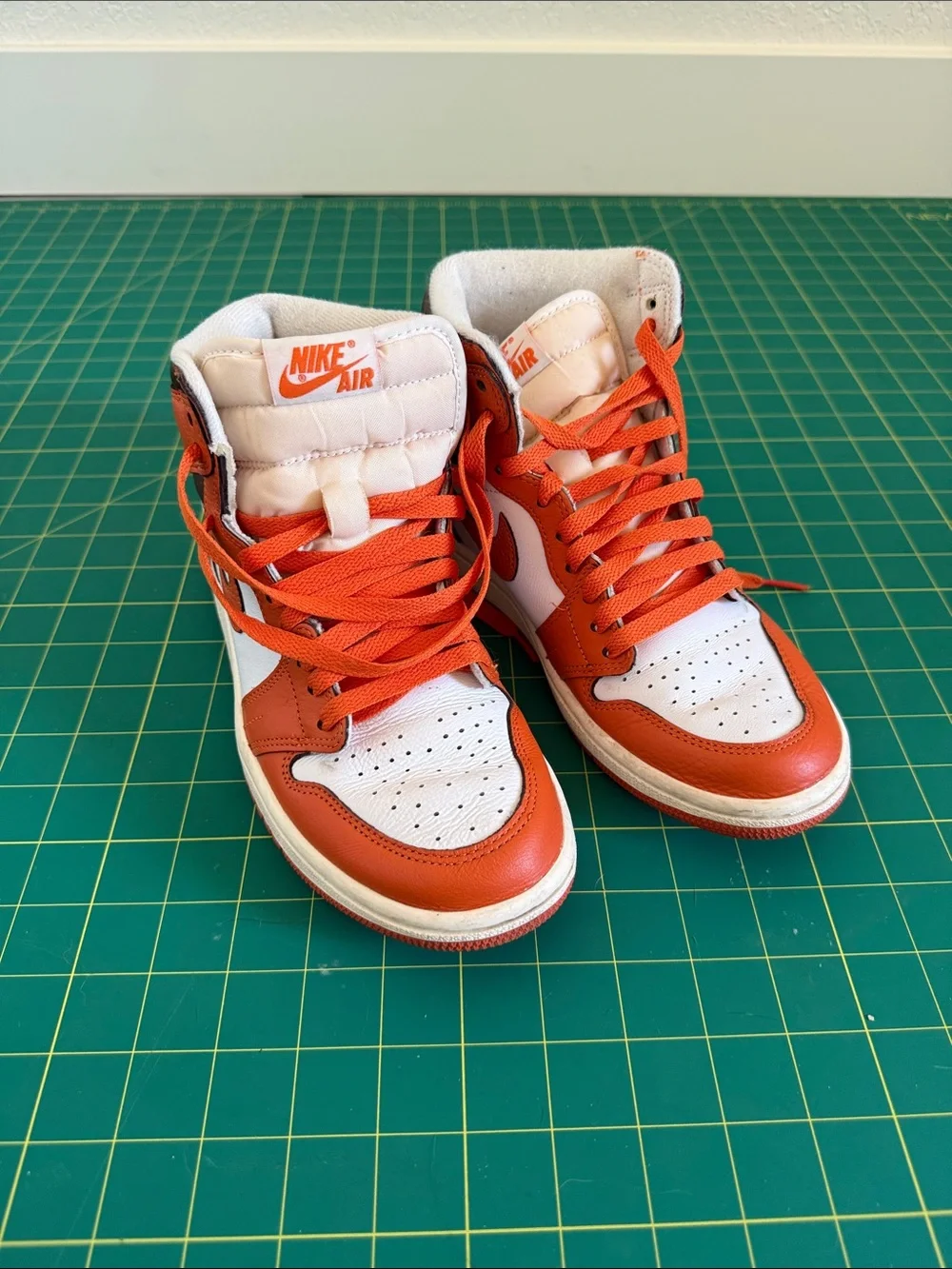 Nike High-Top Sneakers in Orange and White
