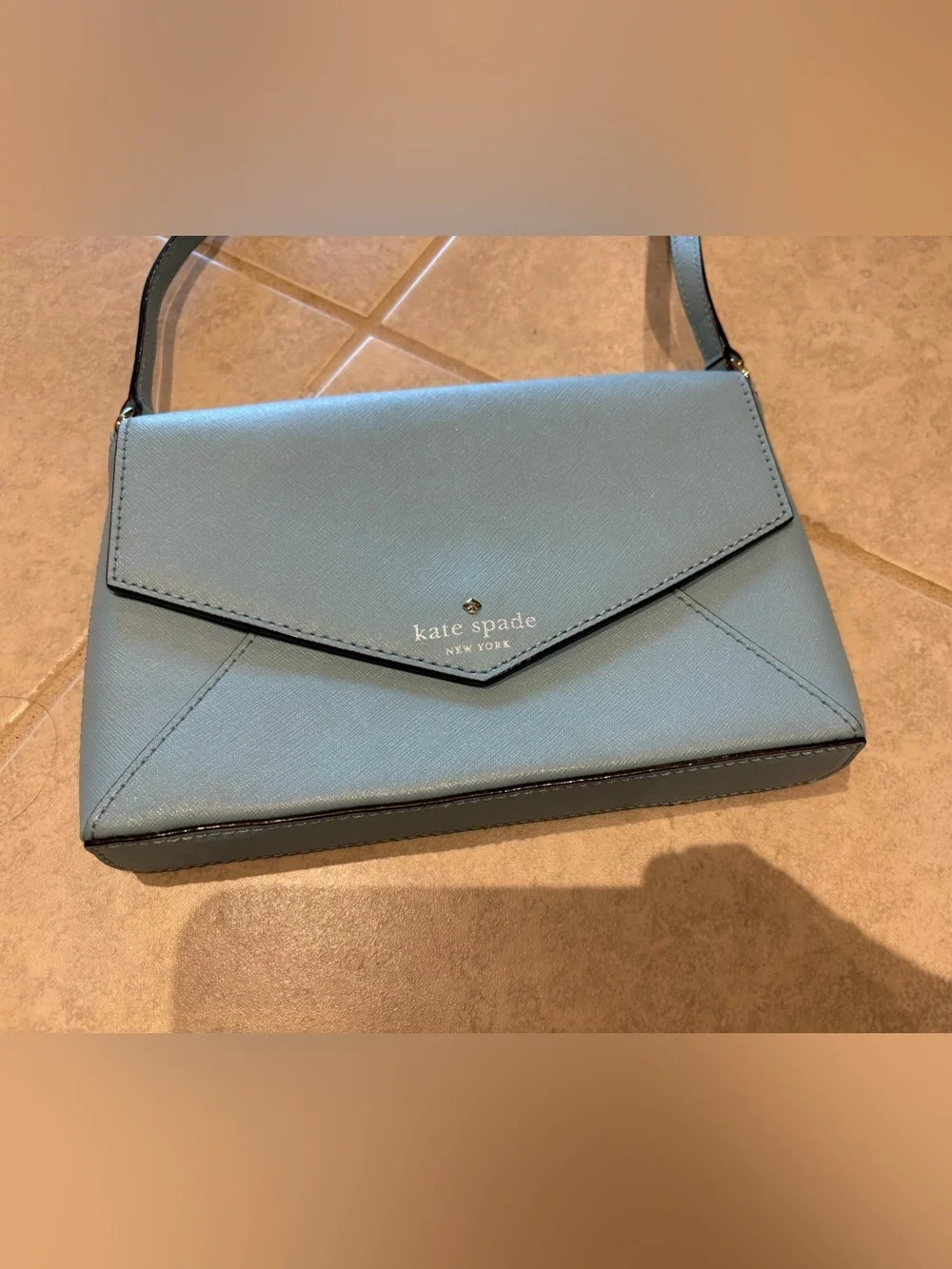 Kate Spade NY Cedar Street Monday envelope style leather crossbody bag blue