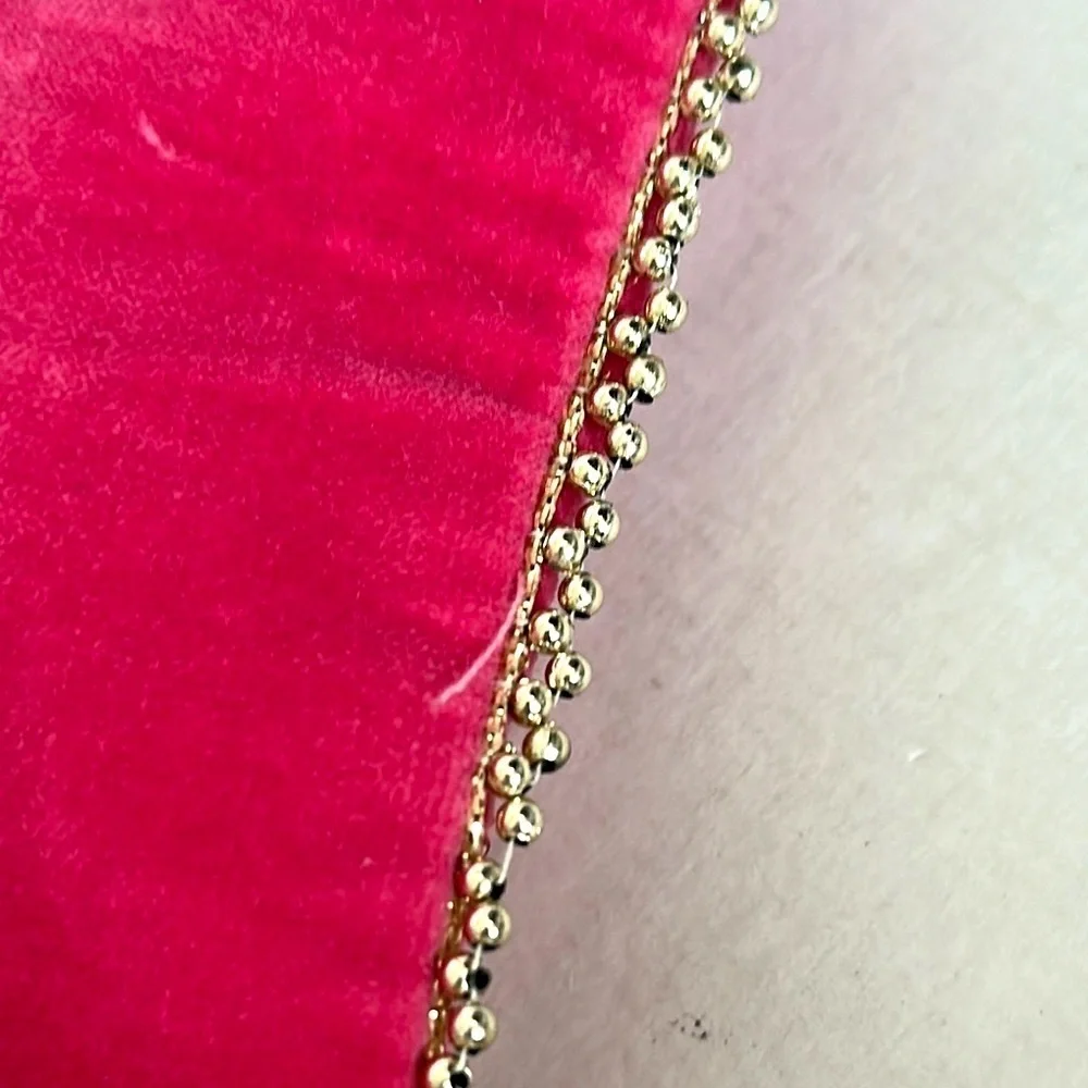 Jane Marie elegant tassel adding