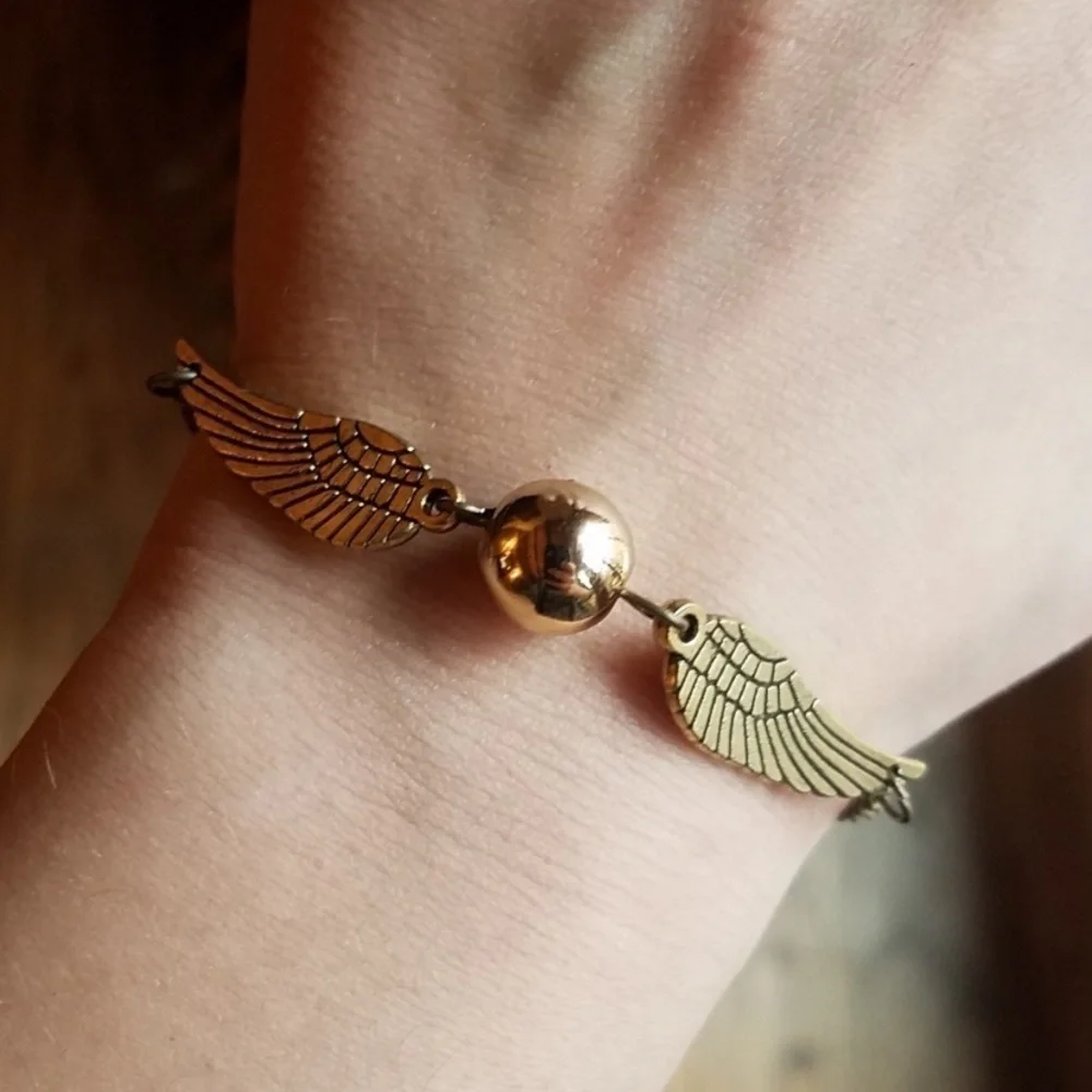 NEW Harry Potter Golden Snitch Wing Bracelet Bronze Chain Lobster Clasp
