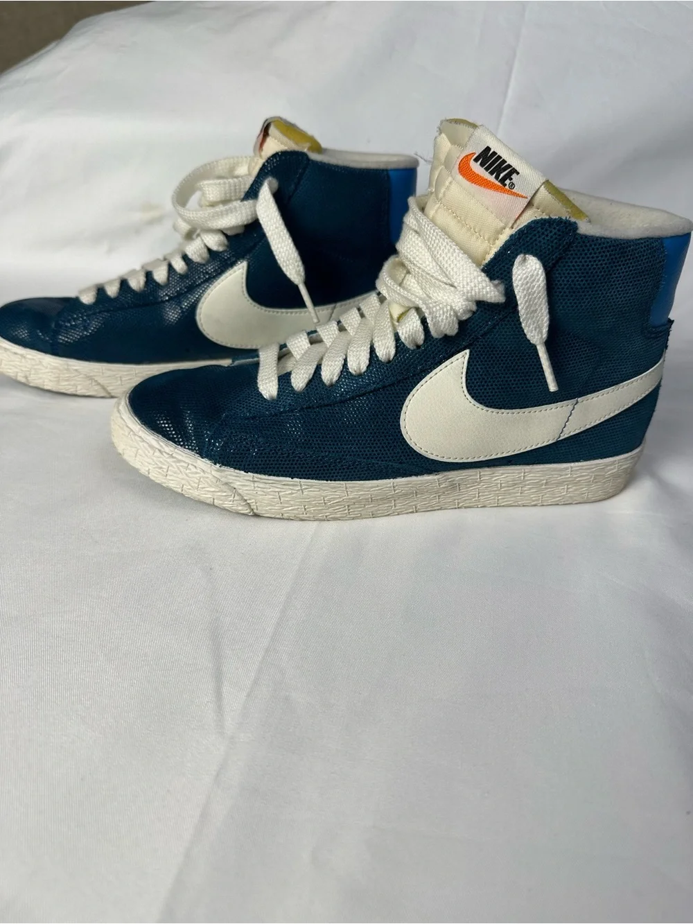 Nike Blue High-Top Sneakers with White Swoosh