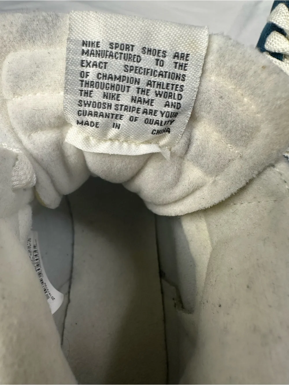 Nike Blue High-Top Sneakers with White Swoosh