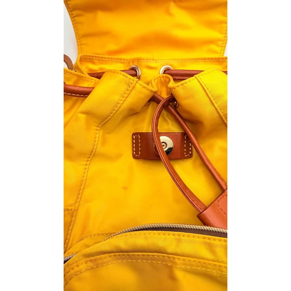 Dooney & Bourke Nylon Murphy Backpack Flap Tassel Drawstring Womens Yellow