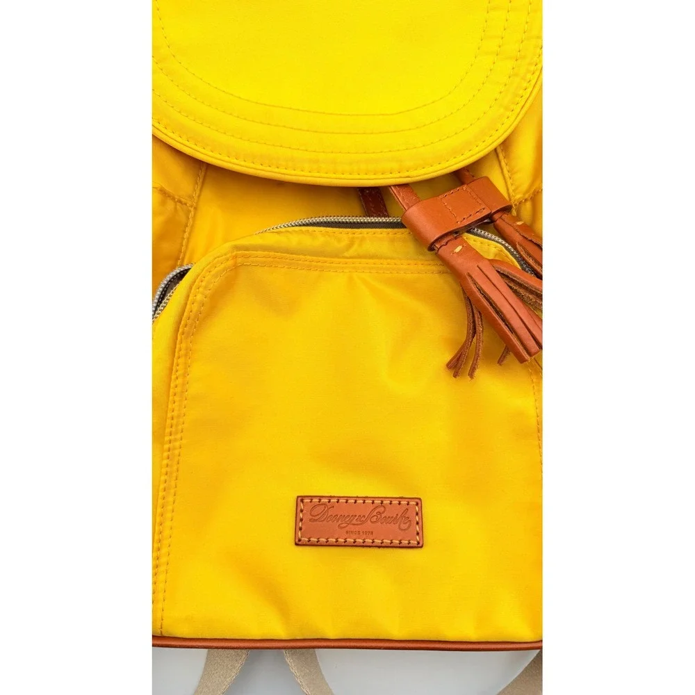 Dooney & Bourke Nylon Murphy Backpack Flap Tassel Drawstring Womens Yellow