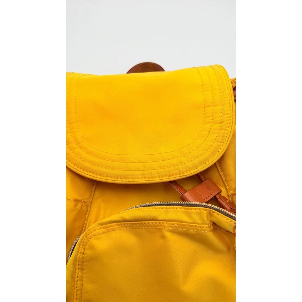 Dooney & Bourke Nylon Murphy Backpack Flap Tassel Drawstring Womens Yellow