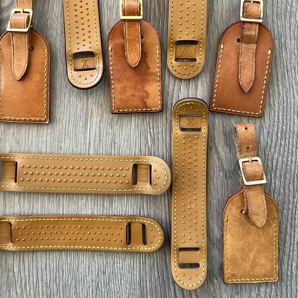 Lot of 17 LV pieces (tags and shoulder pads) Louis Vuitton
