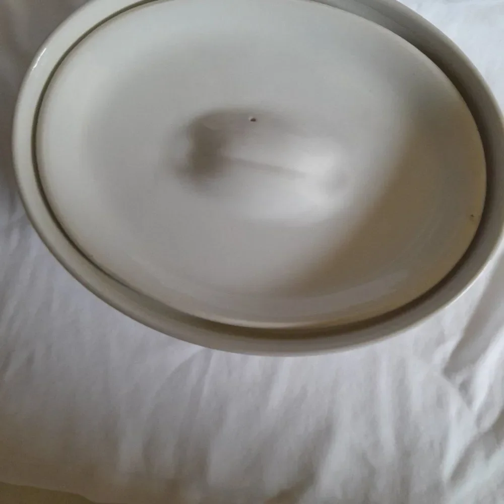 Corningware covered below oval