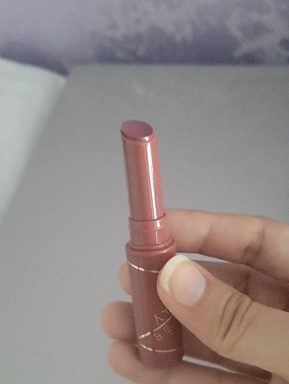 Aura lipstick muted