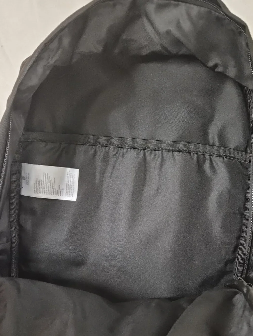 Nike Black Backpack with White and Red Accents