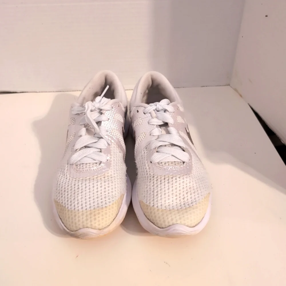 Nike white revolution
