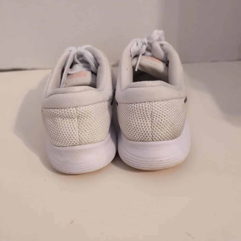 Nike white revolution
