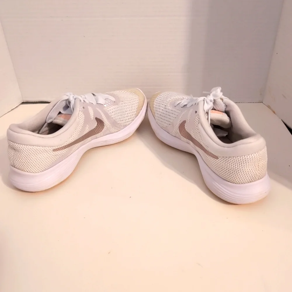 Nike white revolution