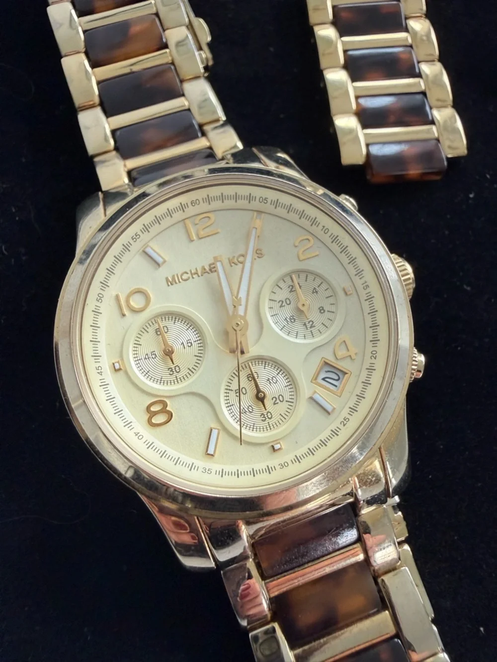 Michael Kors gold tone